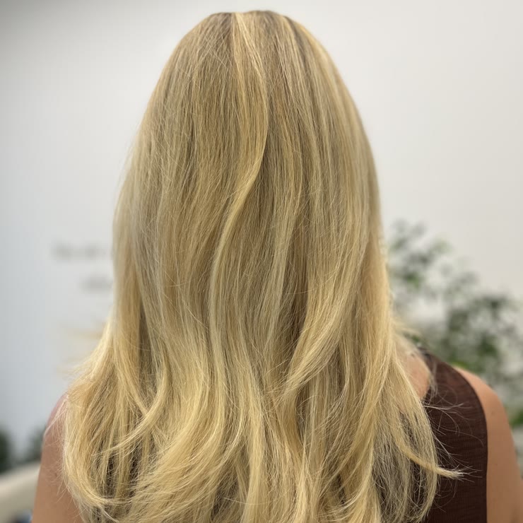 Blonde balayage with layers, shoulder length