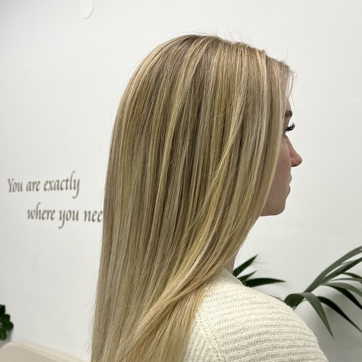 Blonde highlights on straight hair, side view