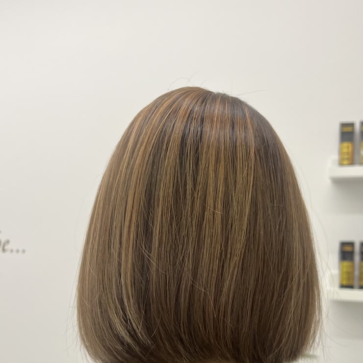 A blunt bob with soft light highlights
