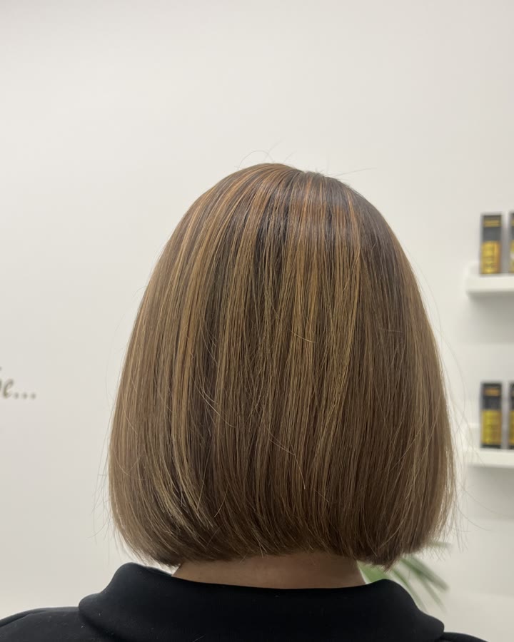 A bob with soft light highlights, after the cut